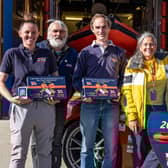Volunteer crew and management with Belinda and James Richardson at Staithes and Runswick RNLI lifeboat station - Image: RNLI/James Stoker