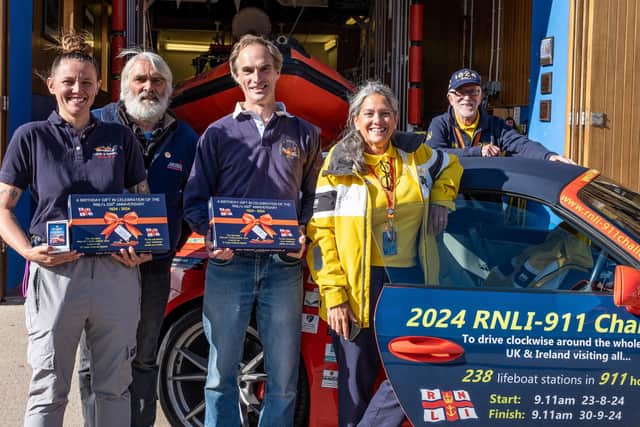 Volunteer crew and management with Belinda and James Richardson at Staithes and Runswick RNLI lifeboat station - Image: RNLI/James Stoker