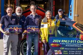 Volunteer crew and management with Belinda and James Richardson at Staithes and Runswick RNLI lifeboat station - Image: RNLI/James Stoker