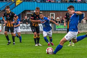 Jacob Graton scores the winner for Whitby Town from the penalty spot in the FA Cup clash against Morpeth Town. PHOTOS BY BRIAN MURFIELD