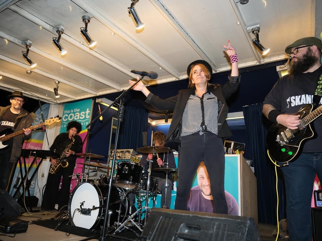 Skandals perform on the main stage.