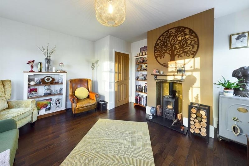There's a lounge within the apartment with a cosy log burning stove, and three double glazed sash windows,