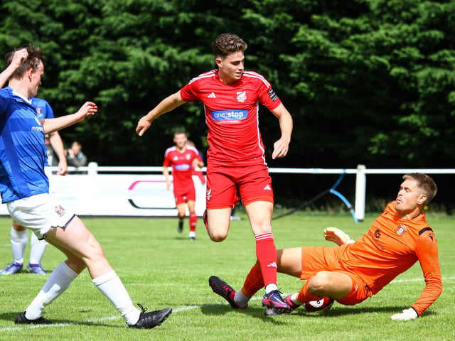 Dom Tear is halted by the Marske United keeper.