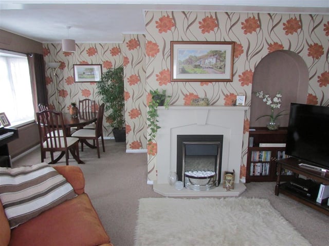 Inside the three-bedroom park home, that has parking spaces and gardens.