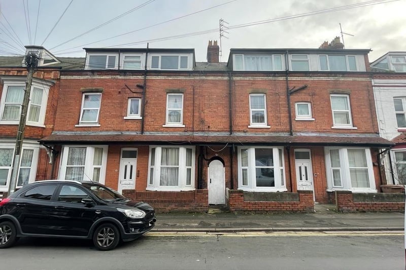 This eight bedroom terraced house is for sale with Colin Ellis Property Services for £310,000.