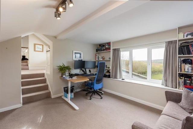 A fourth double bedroom, currently used as a study.