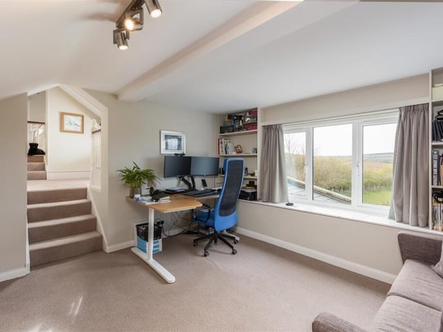 A fourth double bedroom, currently used as a study.