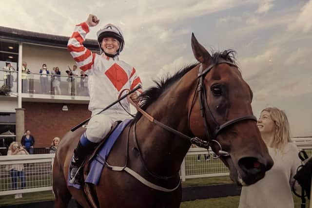 Vicky Pears celebrating victory on Noodles Blue Boy