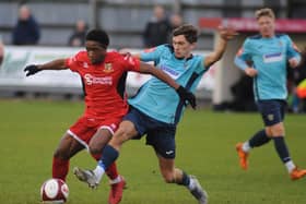 Glen San tries to hold off a Consett player during Bridlington Town's 3-0 home triumph last weekend.
