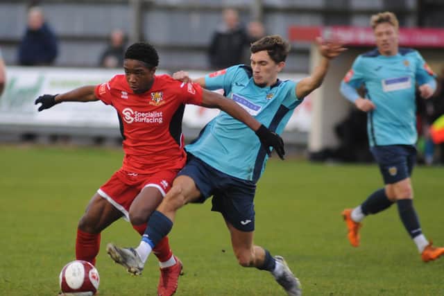 Glen San tries to hold off a Consett player during Bridlington Town's 3-0 home triumph last weekend.