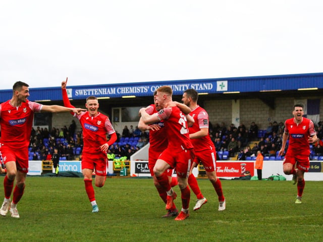 The Scarborough players get in the party mood after their injury-time equaliser at Chester.