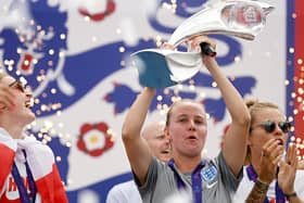 Whitby's England striker Beth Mead of England celebrates with the UEFA Women's EURO 2022 Trophy.
Photo by Leon Neal/Getty Images)