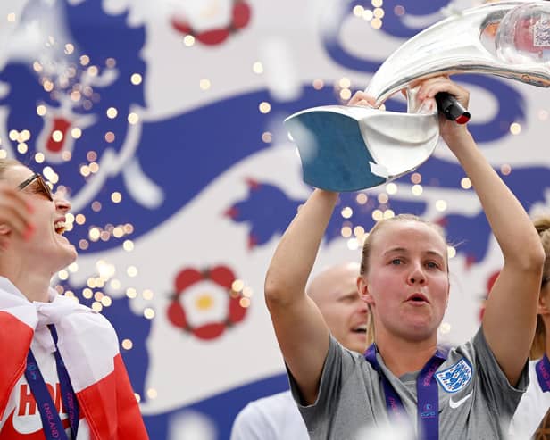 Whitby's England striker Beth Mead of England celebrates with the UEFA Women's EURO 2022 Trophy.
Photo by Leon Neal/Getty Images)