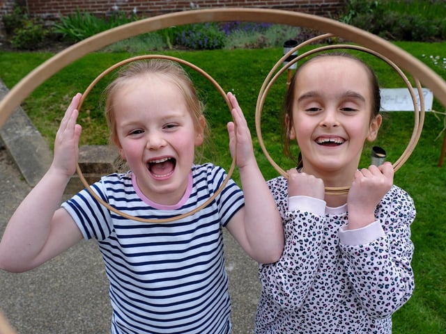 SIsters having fun at Pannett Park, Whitby.