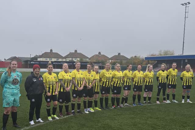 Scarborough Sirens line up before the silence at Queensgate on Remembrance Sunday.