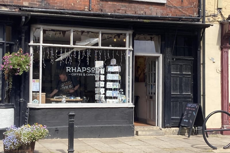 Rhapsody Coffee & Co is located on the High Street in Old Town. One Tripadvisor review said ". Expert coffee making, teas etc. The dark hot chocolate is to die for. Selection of cakes, teacakes and bagels.Very pleasant owner, and ambience."