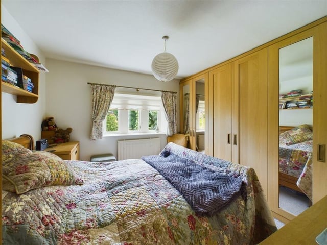 A double room with fitted wardrobes.