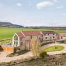 This impressive farmhouse is on the market at £1,150,000