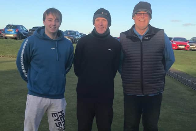 From left, runner-up Josh Emmerson, Robin Hood's Bay Competition Secretary Tim Purcell and Merit winner Chris Dobson.