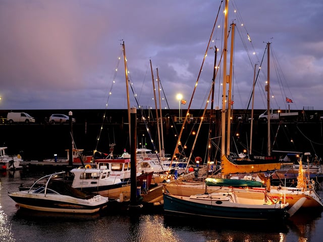 All of the boat owners join the tradition