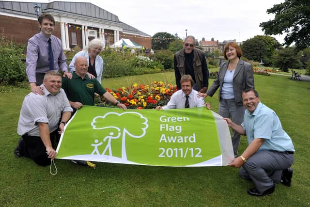 The Friends of Pannett Park, and Scarborough Council parks and countryside gardeners celebrate gaining a Green Flag Award. From left, Chris Roe, SBC environmental services, Paul Thompson, operations manager SBC environmantal services, Keith Wright, SBC park keeper, Linda Wilkins, secretary of the Friends, Steve Reynolds (kneeling), SBC environment and countryside manager, Owen Moore, vice chair of the Friends, Linda Sims, PR for the Friends, and Cllr Joe Plant(kneeling right), chairman of the Friends.