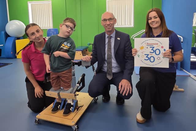 Lara Whitton, Physiotherapist at The Movement Centre with three-year-old Percy Whitehead from Scarborough, 30 for 30 fundraiser Nigel West from Fiveways Insurance Group and Claire Snape, Head of Fundraising at the charity in Oswestry.