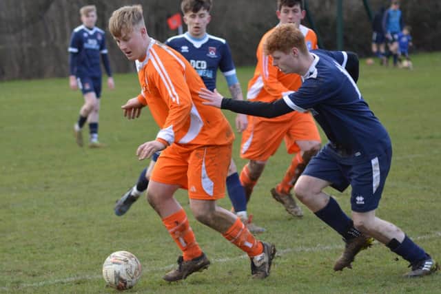 Jamie Atkinson in action for Heslerton during the 3-2 win at Duncombe Park Reserves
