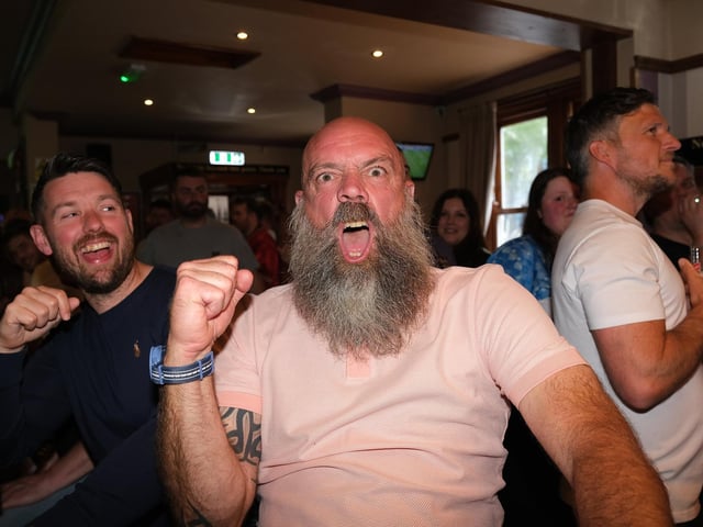 A fan cheering for England.picture: Richard Ponter