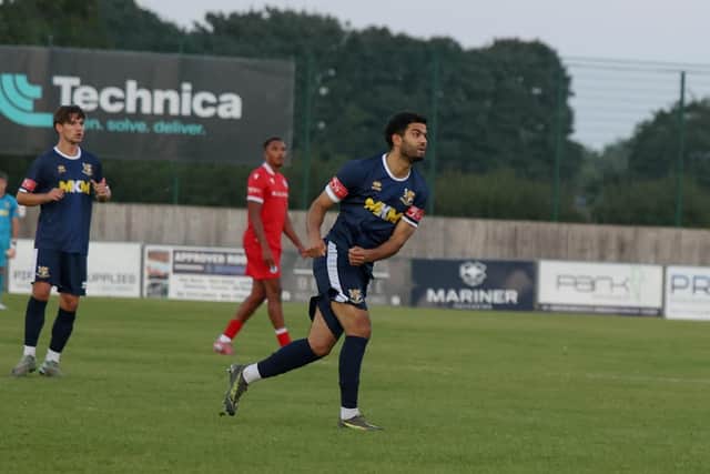 Ahmed Salam watches an early effort hit the bar at Grimsby Borough. Photo by EC Media