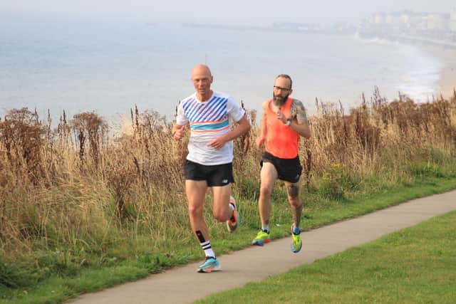 Brid Road Runners veteran Phill Taylor, orange top, won the Sewerby parkrun on Saturday morning. PHOTOS BY TCF PHOTOGRAPHY