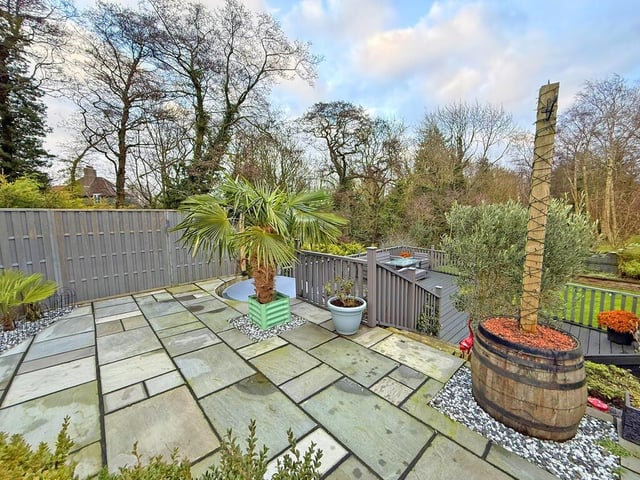 Paved patio space with views over the garden.