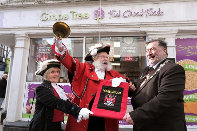 Scarborough town crier David Birdsall and consort Veronica Dickinson invite Scarborough Mayor Cllr Eric Broadbent to ring the pancake bell.