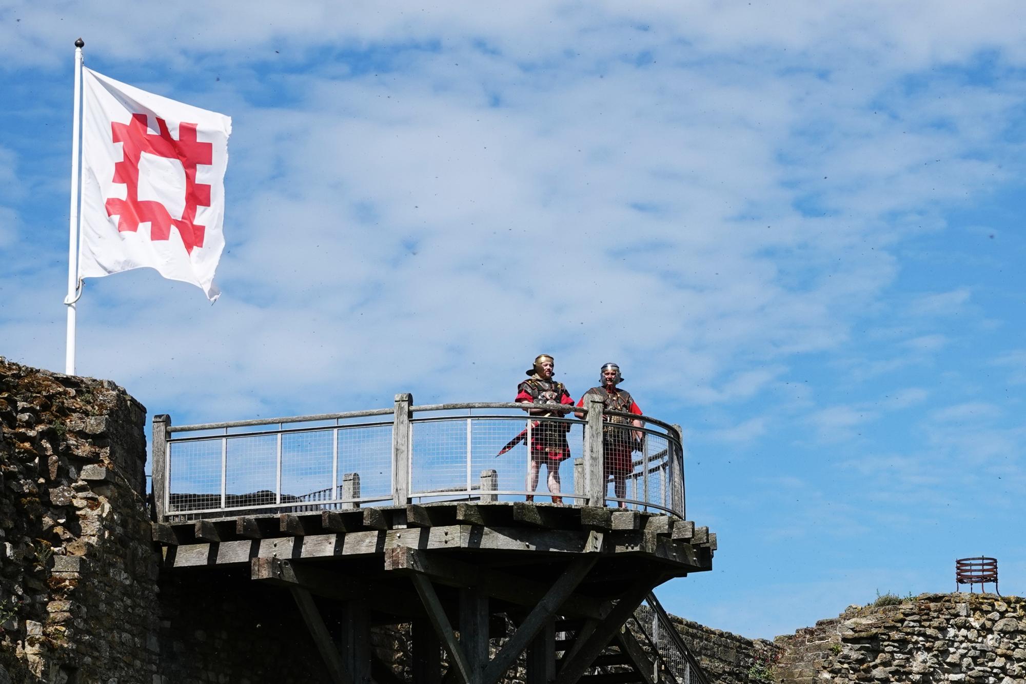 Two members of the Roman VI Legion observe the Big Day Out from the viewing platform at Scarborough Castle