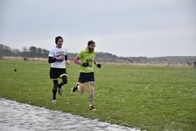 Phill Taylor dodges the ice and snow on his way to winning the Sewerby parkrun on Saturday. PHOTOS BY TCF PHOTOGRAPHY