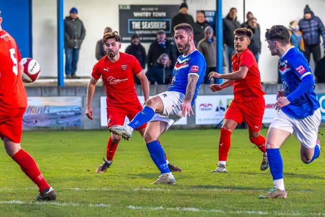 Matty Tymon scores Whitby Town's consolation as they slipped to a 3-1 home loss against Workington AFC. Photo by Brian Murfield