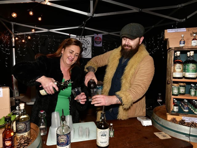 Janine Robinson and Piers Moat preparing a festive tipple