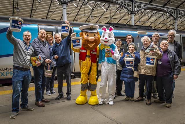 Volunteers get a helping hand from the Easter Bunny and Stormy Stan