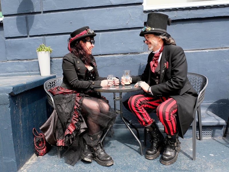 Having a quiet drink away from the hubbub of the event.