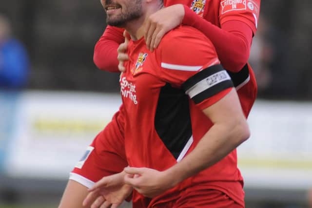 Alex Markham jumping on James Williamson after his goal for Bridlington Town in Saturday's 3-0 home win against Consett. PHOTO BY DOM TAYLOR