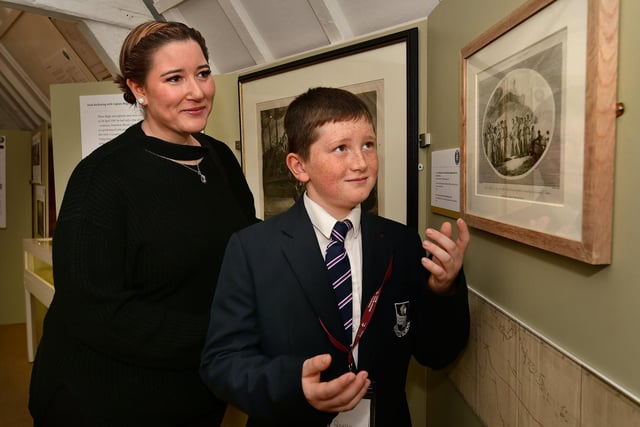 Visitor Aisha Kennedy being shown the exhibits by an Eskdale School student.
picture: Richard Ponter