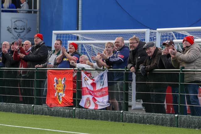 Bridlington Town supporters celebrate the goal at Ponte. Photo by ECmedia