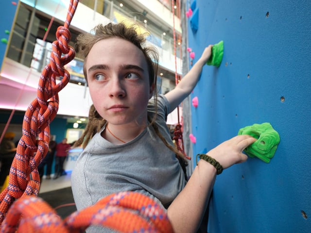 Nate Bonney climbing the wall. picture: Richard Ponter