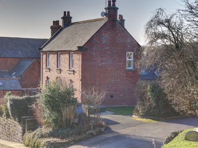 The driveway to the detached property that has its own parking space, with additional on road parking.