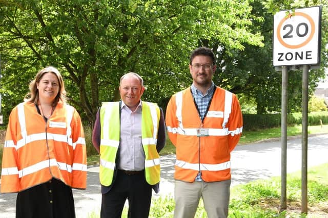 Councillor Paul West (centre) said the council wants to promote safer driving habits.