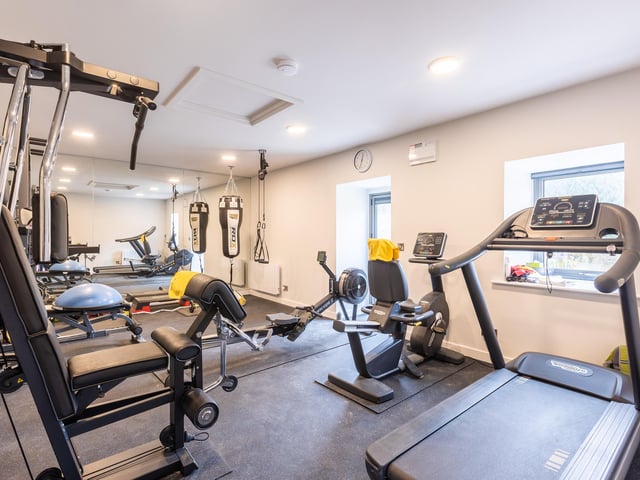 One of the barns was converted to this spacious gym.