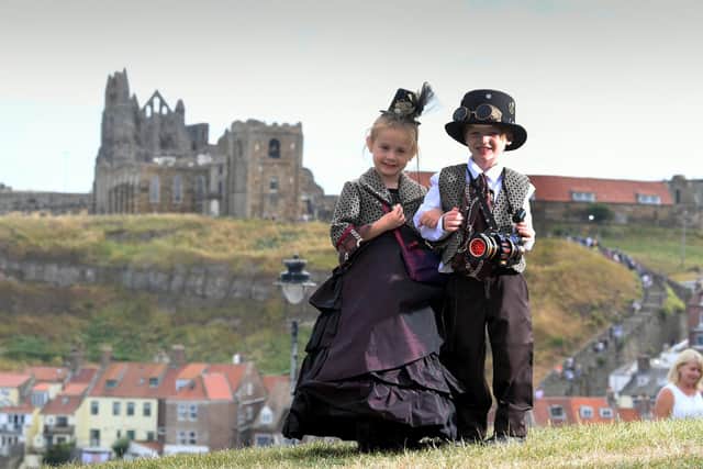 Isabella Hayton with her brother Matthew, 5, pictured with the Abbey in the background.
Picture by Simon Hulme.