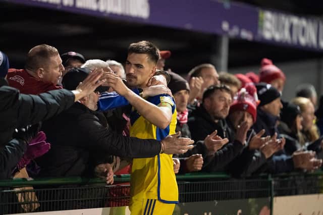 Skipper Will Thornton thanks Boro fans after their play-off loss at Buxton. Photo by Wandering Photography.