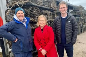 Alison Hume with members of the fishing community. (Photo: Contributed)