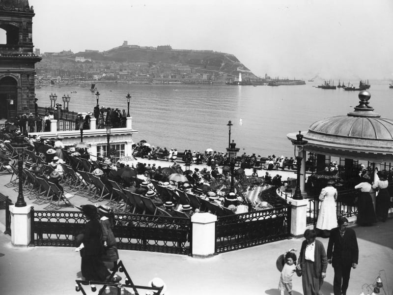 circa 1913: Holiday crowds listen to the band playing in the bandstand at the Spa, Scarborough. (Photo by Hulton Archive/Getty Images)