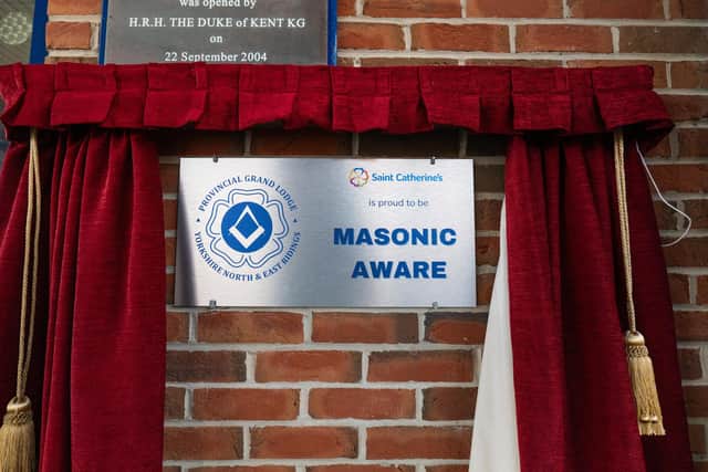 A plaque has been unveiled to celebrate Saint Catherine's becoming masonic aware.